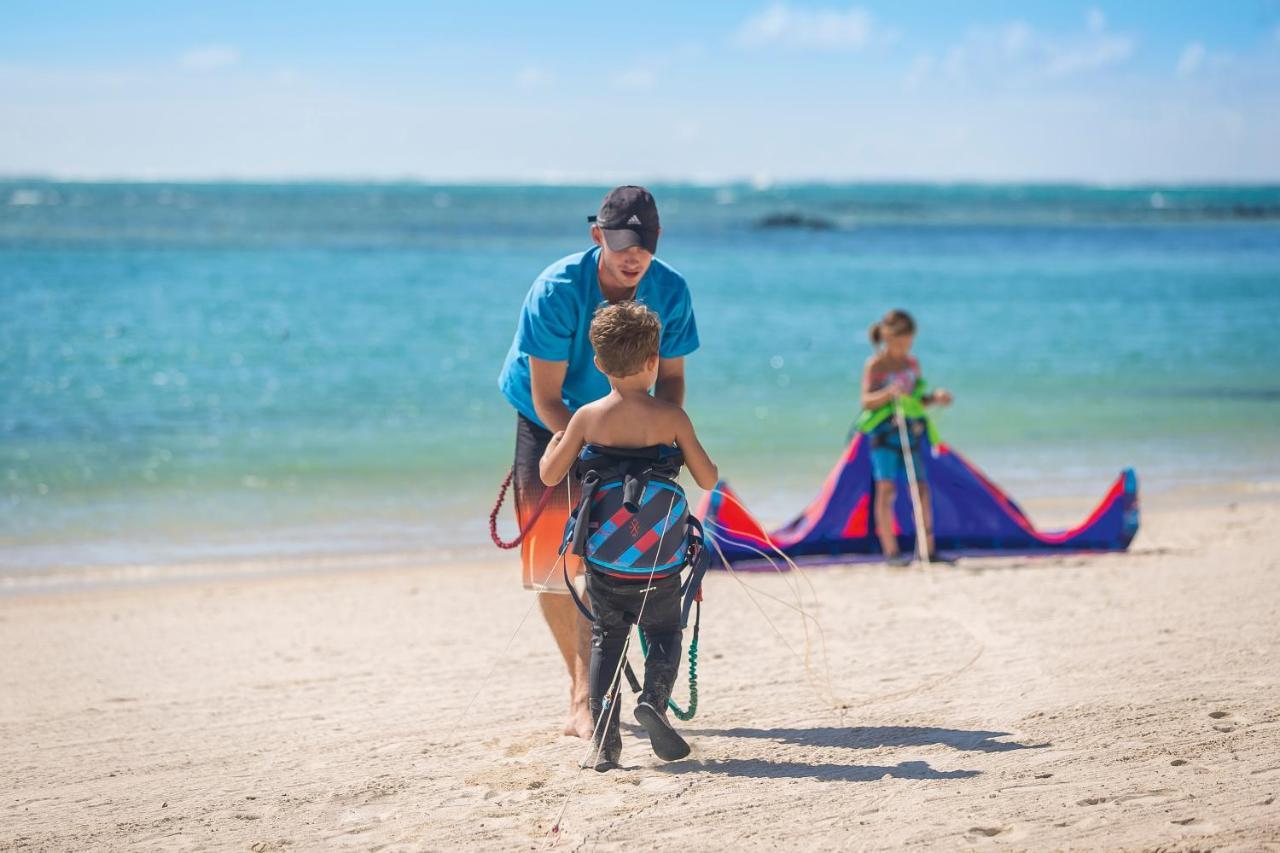 คอนสแตนซ์ ปริ้นซ์ โมริซ Hotel ป๊อสเตอ เด ฟลัคว์ ภายนอก รูปภาพ A kiteboarding instructor with a student